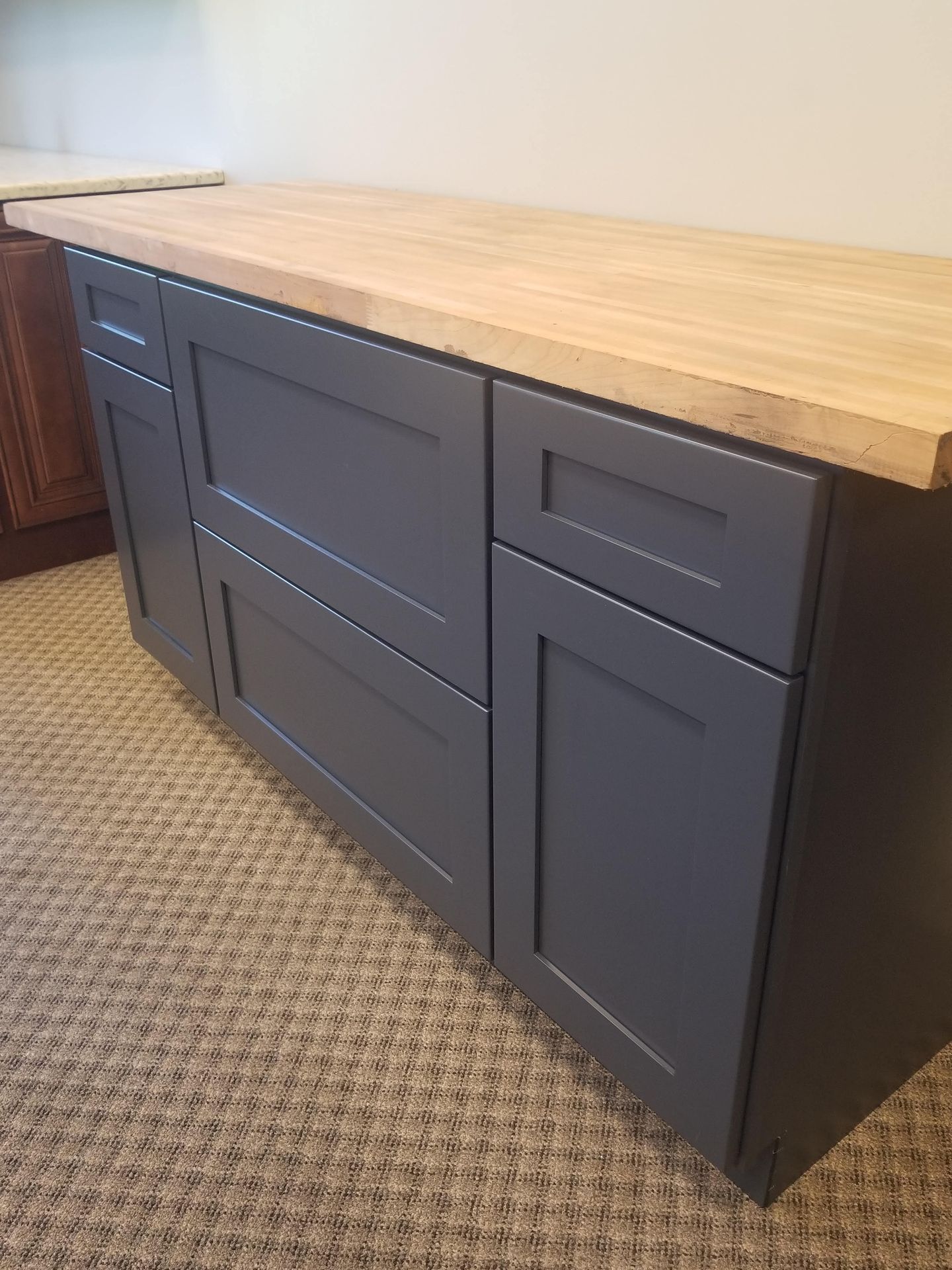 Navy Blue Shaker display with butcher block 