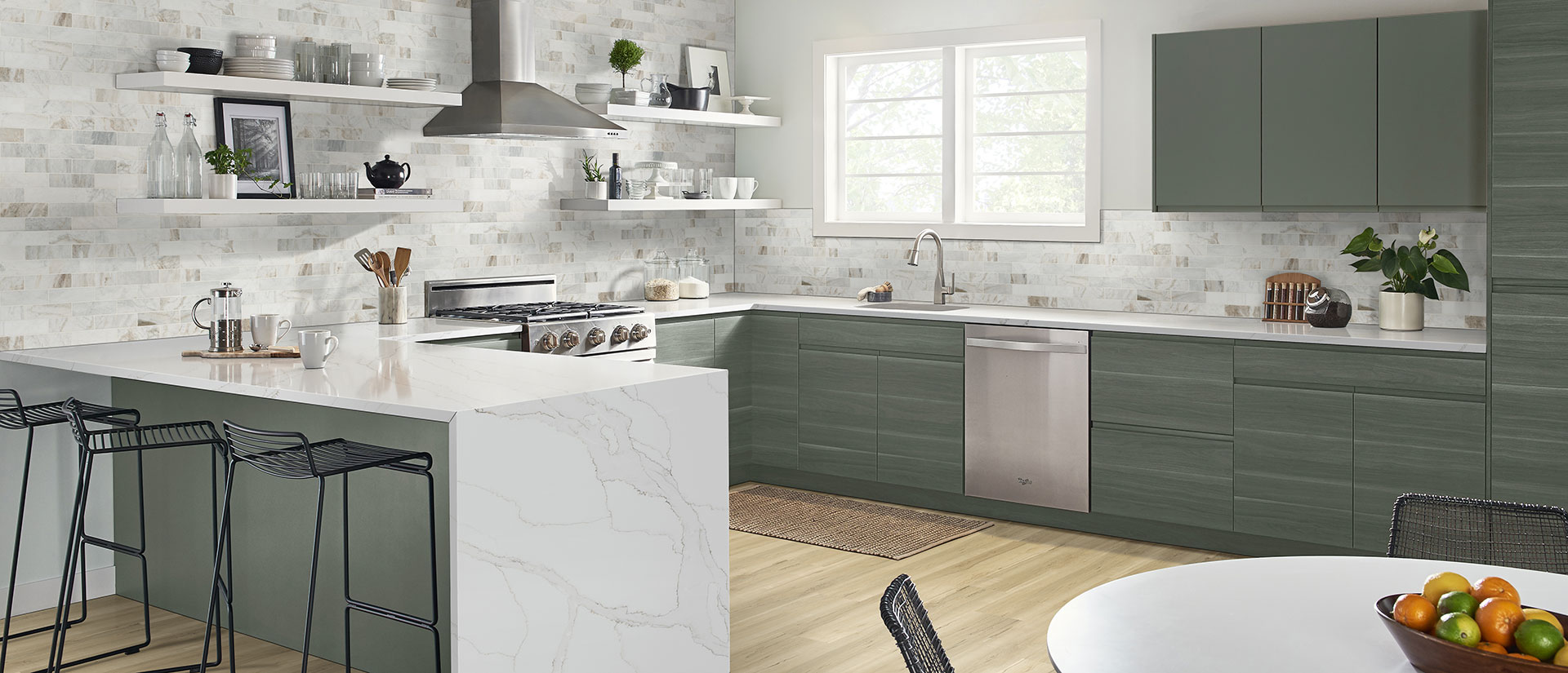 Kitchen with Calacatta Izaro quartz countertops and island