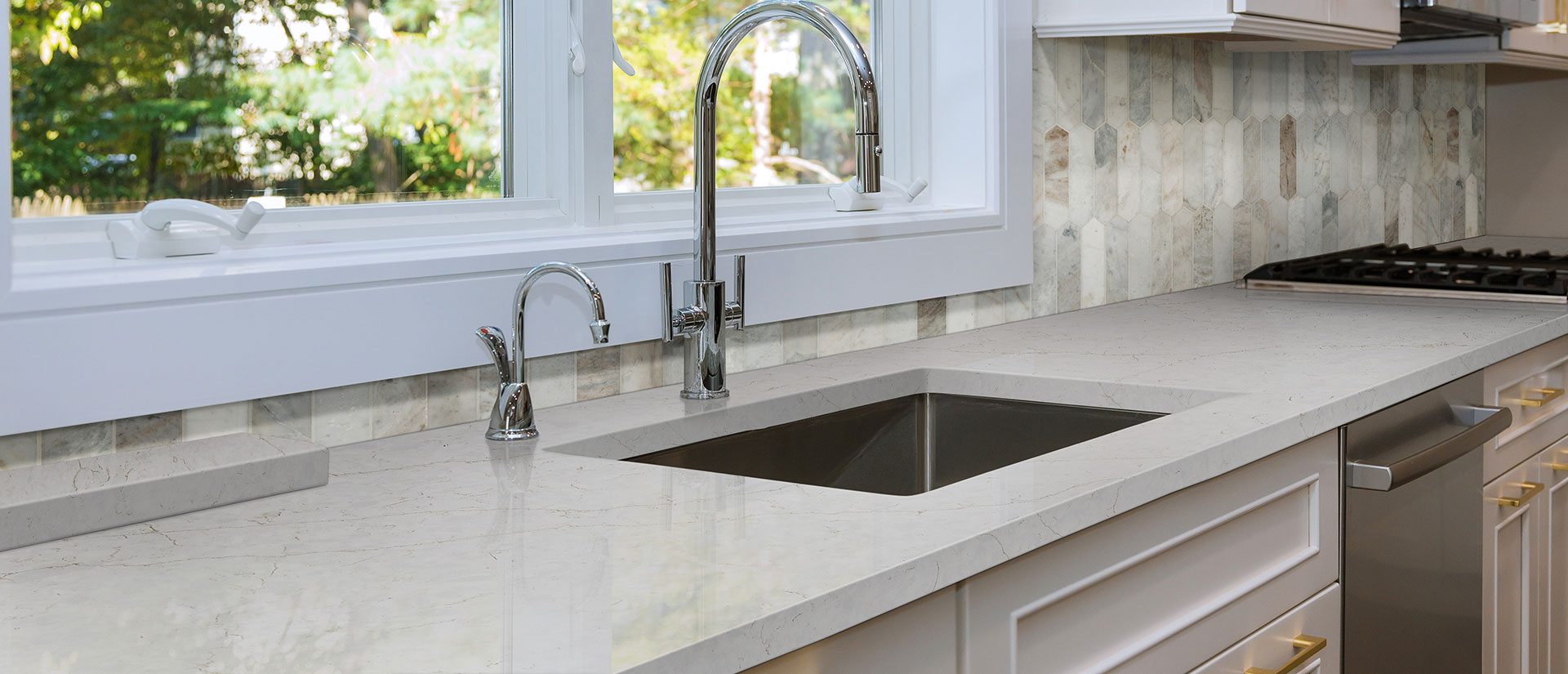 Kitchen with Calacatta Karmelo quartz surfaces