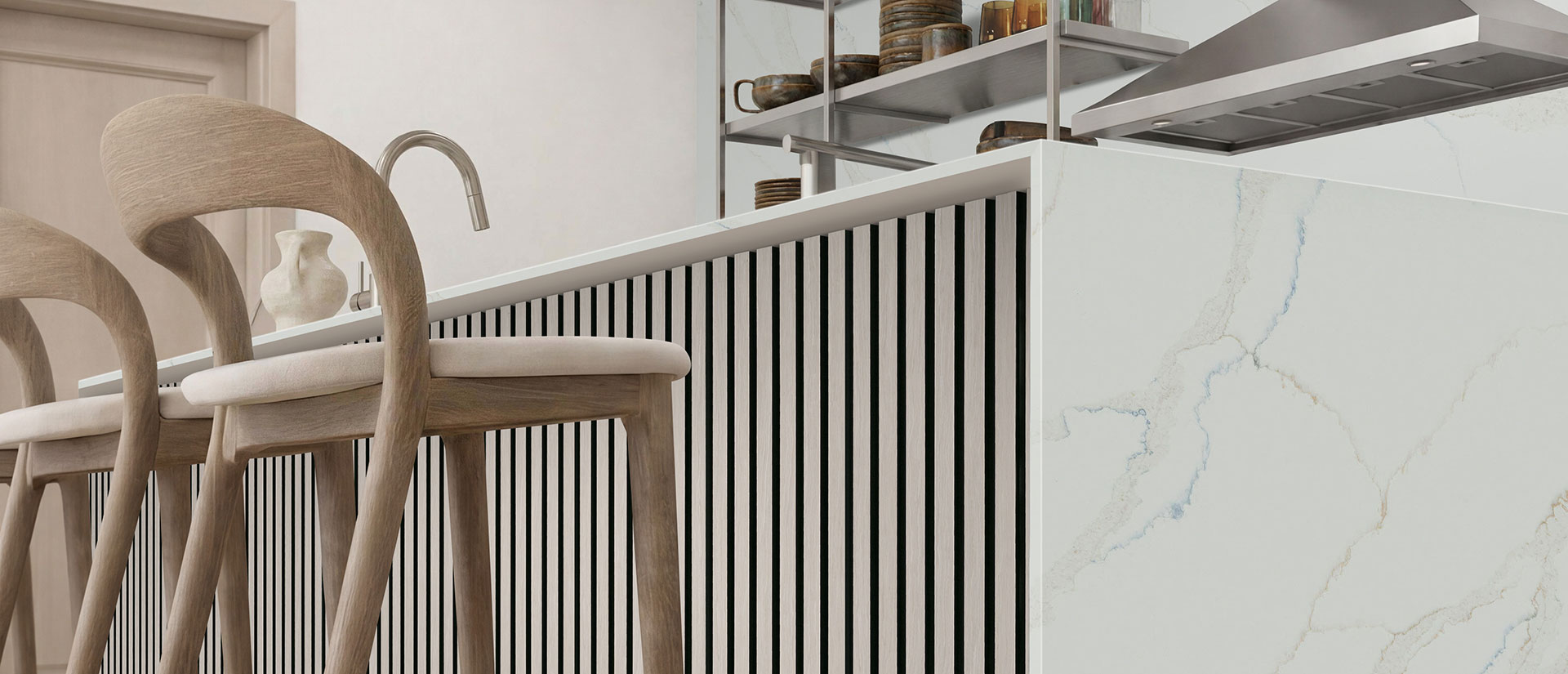 Kitchen with Calacatta Safyra quartz countertops and island