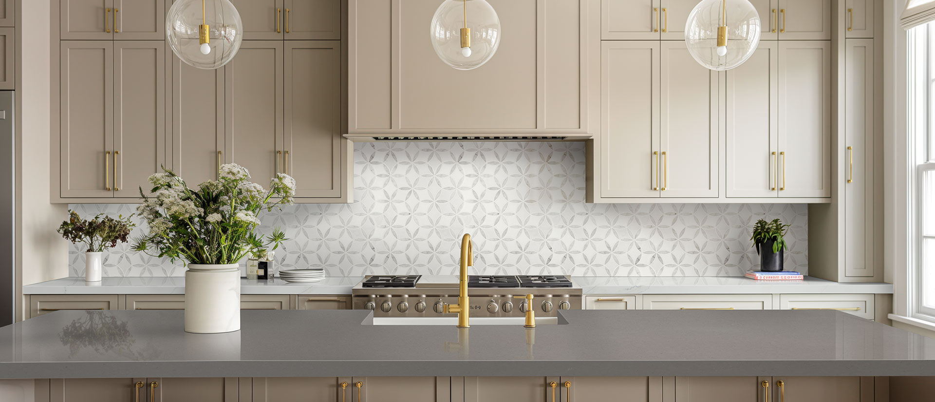 Kitchen with Fossil Gray quartz countertops and island