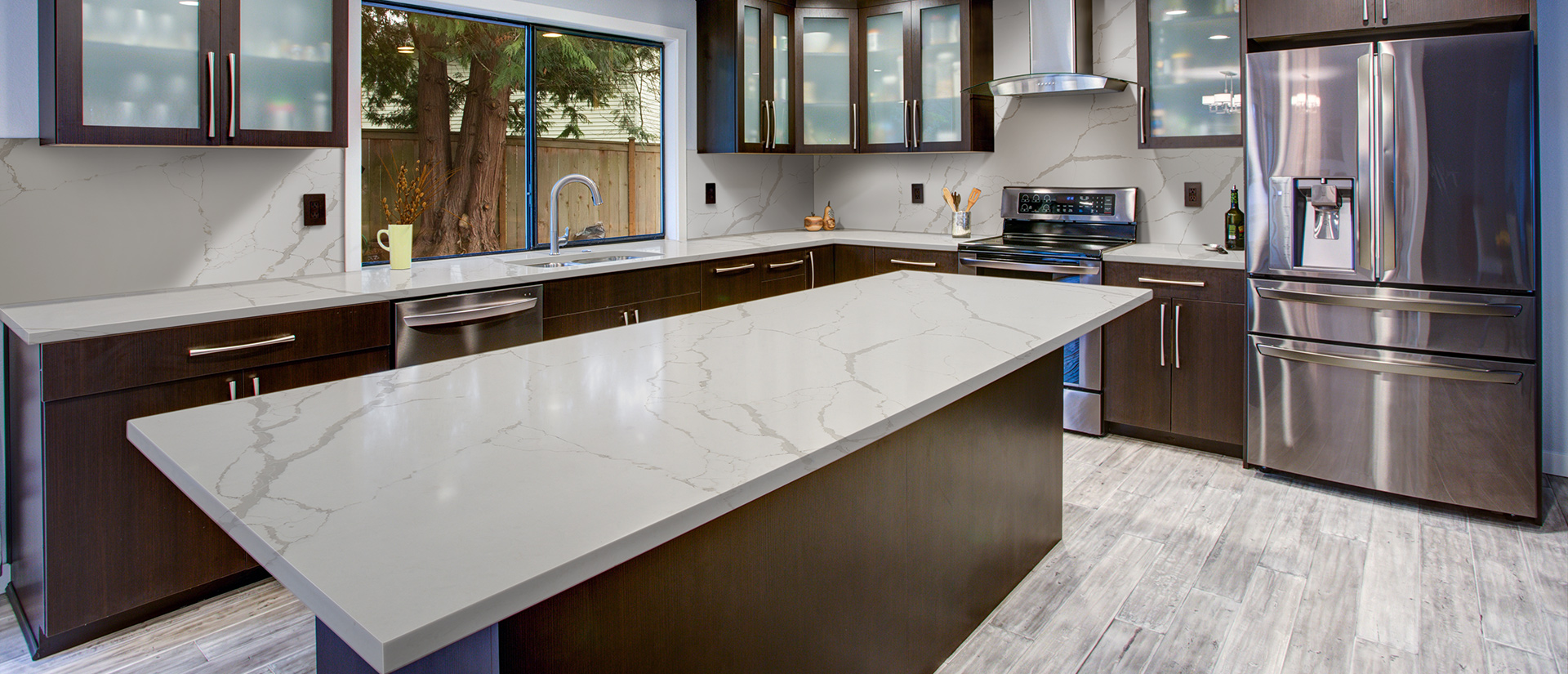 Kitchen with New Calacatta Laza quartz countertops